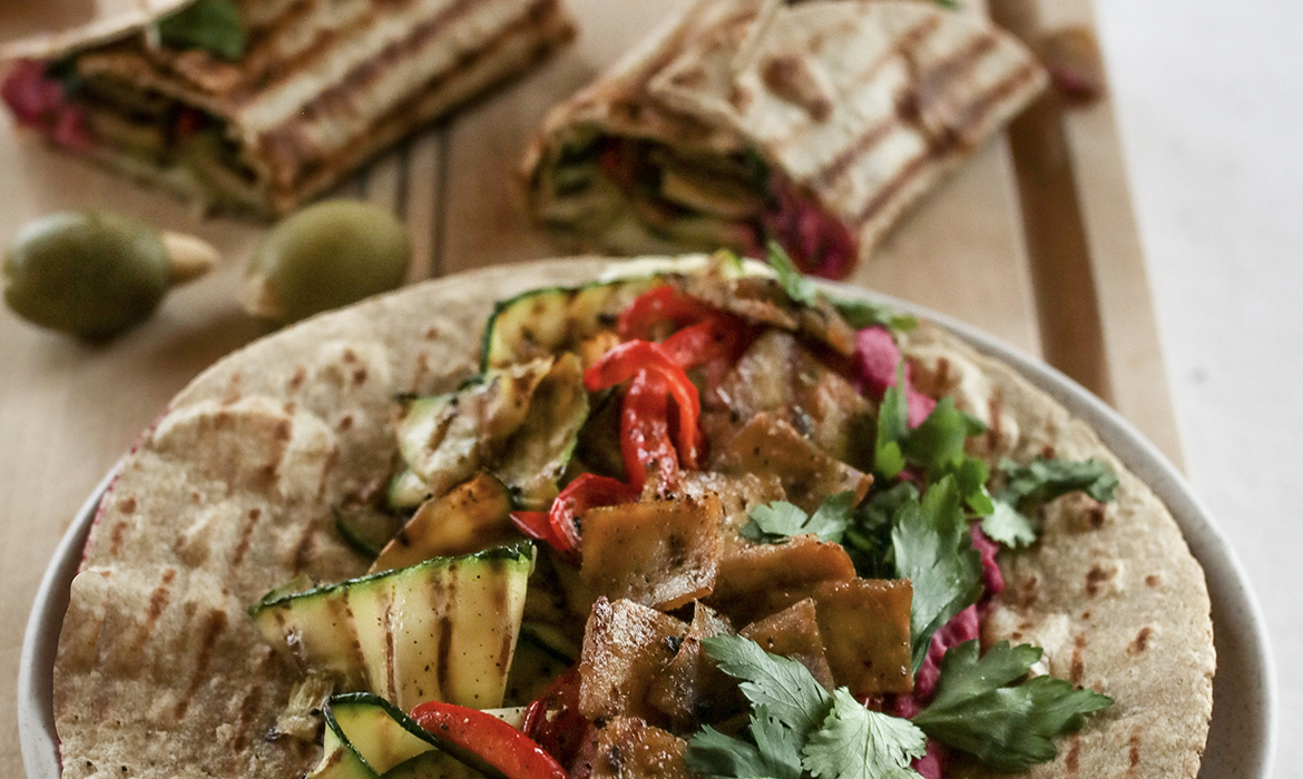 Wrap with grilled vegetables, hummus & tofu