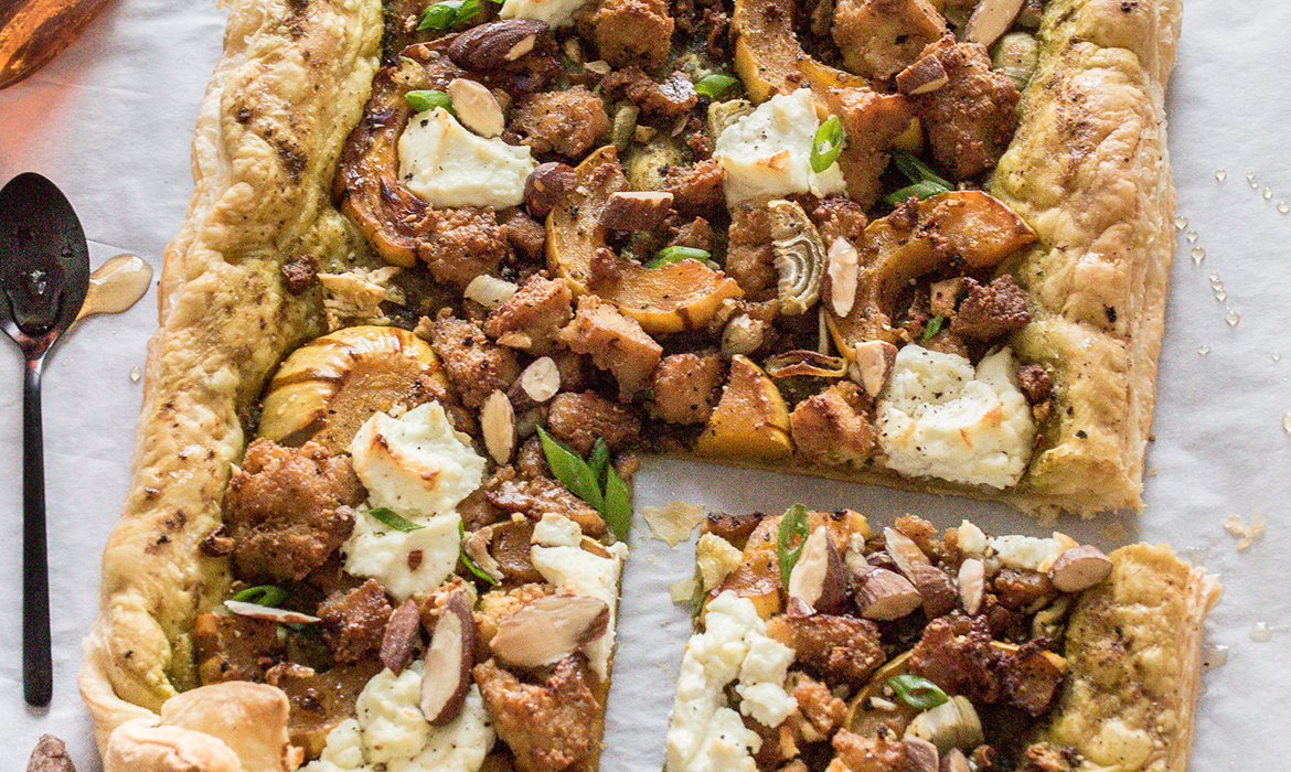 Rustic tart with goat’s cheese, squash, grilled almonds & tofu