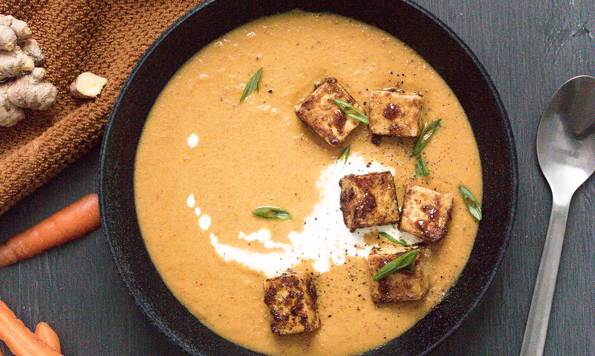 Carrot soup with red curry and crispy tofu garnish